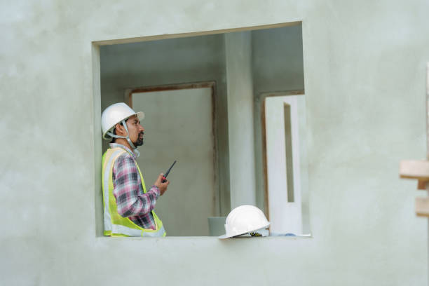 istock Asian Male construction engineer, safety helmet, carrying radio device for communicating with technicians within construction zone, In order make coordination call that is not complicated. 2177282607