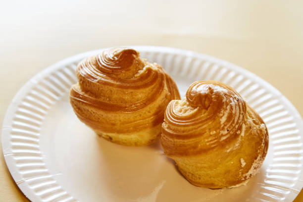 istock French homemade profiteroles on a white plate 2177283537
