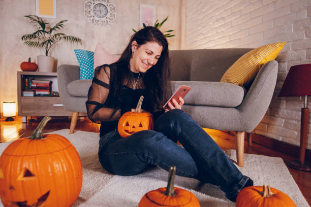 istock Woman enjoy at home while preparing Halloween 2177284472