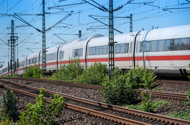 istock Railroad tracks and Intercity train against clear sky 2177284638