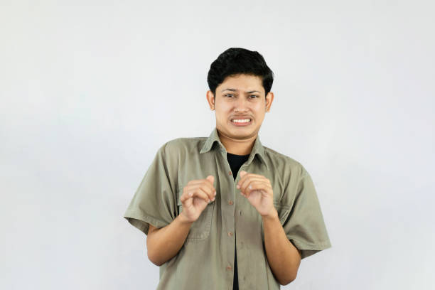istock Frustrated, Irritated and Angry Young Asian Male Handsome Student Boy saying no gestures expressions 2177290339