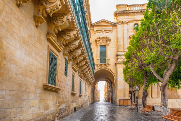 Arched Walkway in Old Medieval Valletta stock photo
