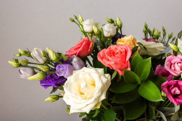 istock Celebrate special occasions with a colorful summer bouquet featuring fresh roses, eucalyptus, and eustoma blooms, creating an elegant and fragrant floral arrangement 2177292907