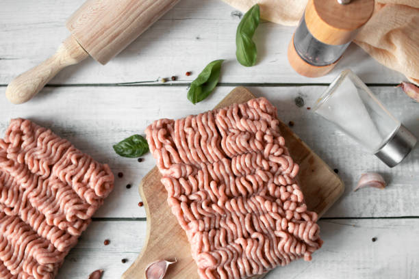 istock Raw minced meat , ingredients for cooking. on wooden background. 2177294391
