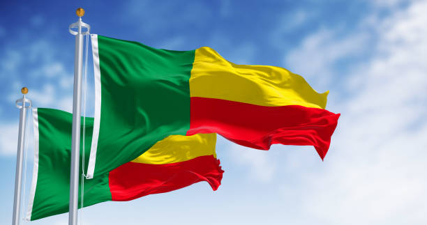istock Two Benin national flags waving on a clear day 2177298037
