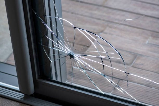 istock Cracked door glass in close-up. 2177298872