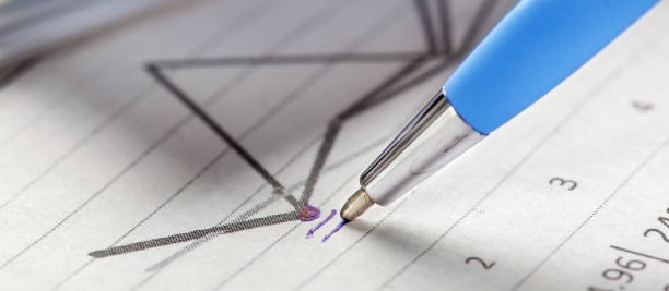 istock Accounting document with pen, share listing and checking financial chart. Concept of banking, financial report and financial audit. 2177300119