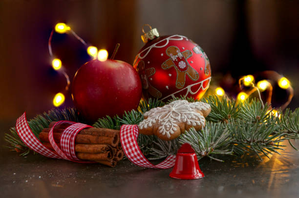 istock Festive composition with Christmas ball, apple, cinnamon sticks and gingerbread 2177300764