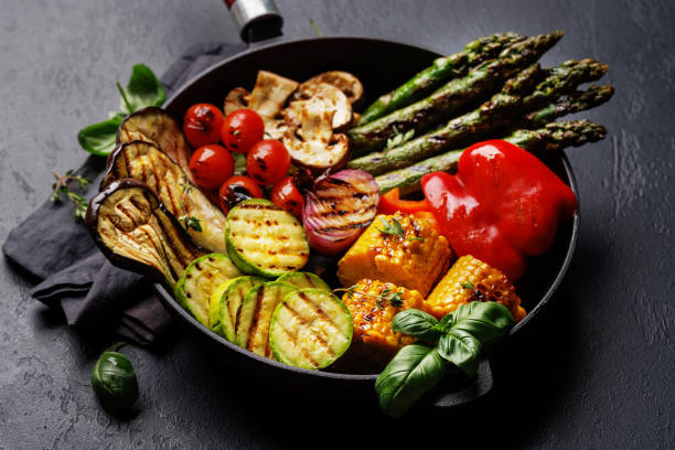 istock Assorted grilled vegetables on a frying pan, showcasing a colorful meal 2177302420