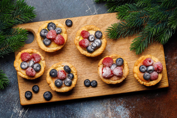 istock Festive delight: Christmas cupcakes adorned with berries 2177302638
