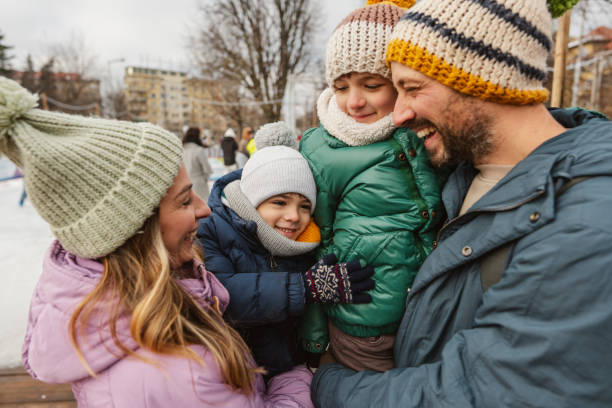 istock Happy family enjoying ice skate 2177305331