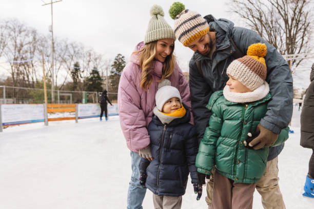 istock Happy family enjoying ice skate 2177305390