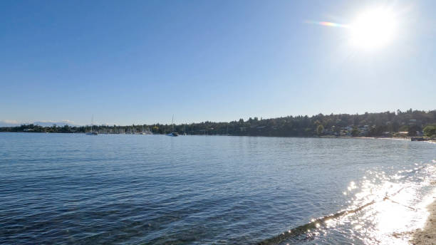 Sunrise over tranquil bay and beach, Cadboro Bay, Victoria