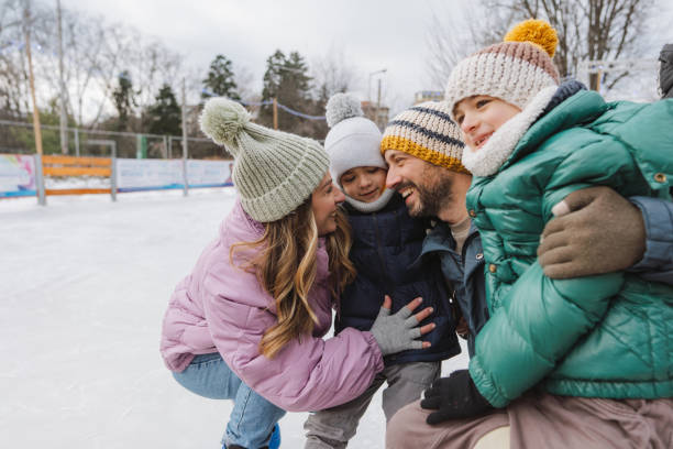istock Happy family enjoying ice skate 2177311631