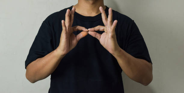 istock Close up Asian man shows hand gestures it means human emotion and expression using sign language 2177312936