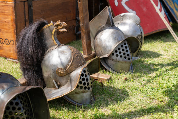 istock Ancient Roman gladiator helmets in a military camp 2177313097