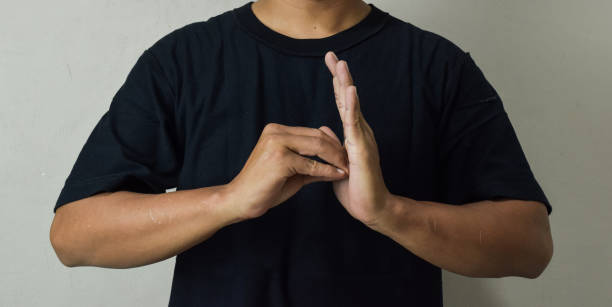 istock Close up Asian man shows hand gestures it means human emotion and expression using sign language 2177313188