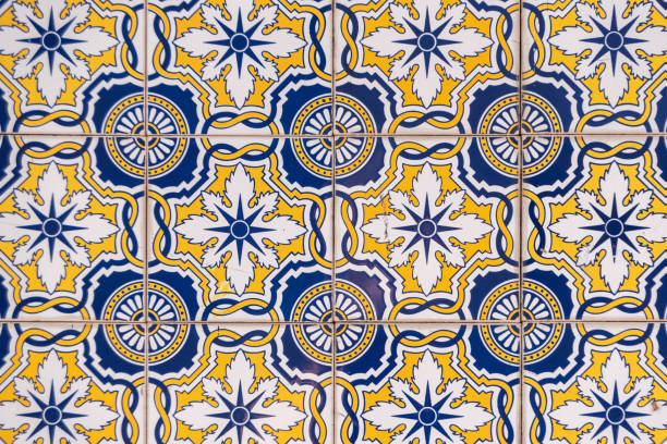 Beautiful Blue and Yellow Decorative Ceramic Tile Pattern on a Facade of a house in Braga, Portugal