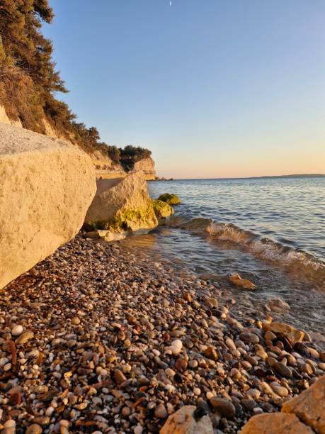 istock Seascape and mossy rocks 2177313438