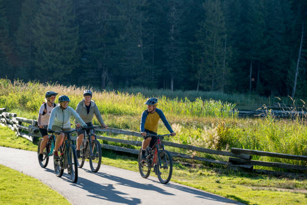 istock Family bike on pathway in forest 2177314040