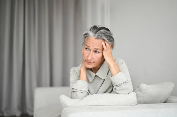 Elegant senior woman feeling tired.