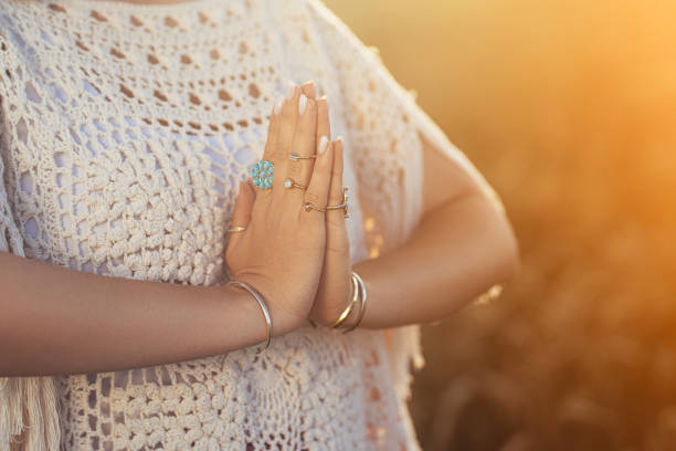 istock Boho Woman Practicing Yoga, Namaste Gratitude Mudra On Nature At Summer. Hands 2177317394