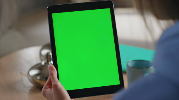 istock Woman working chromakey tablet at modern office workplace closeup. Unknown hands 2177318592