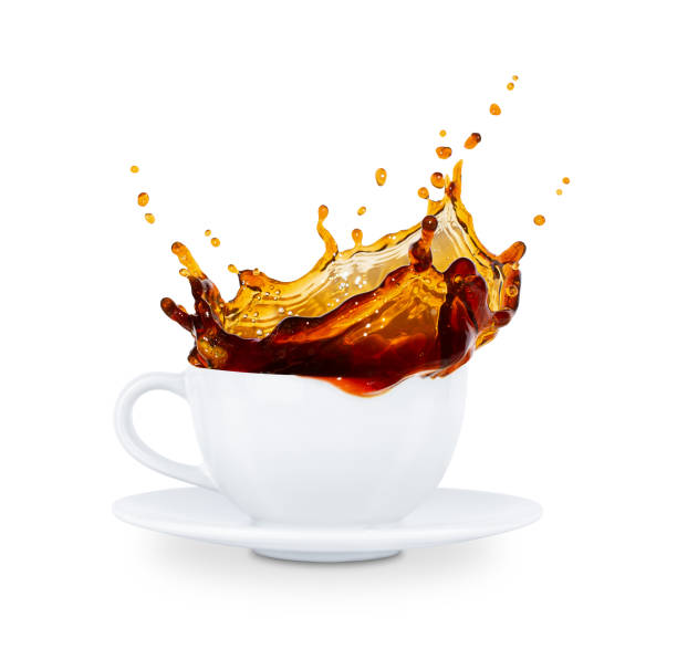 istock A white coffee cup with a splash of coffee spilling over. Isolated on a white background. Stock photo. 2177321726