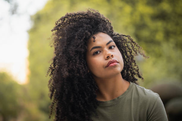 Close-up portrait of a beauty young woman in a park