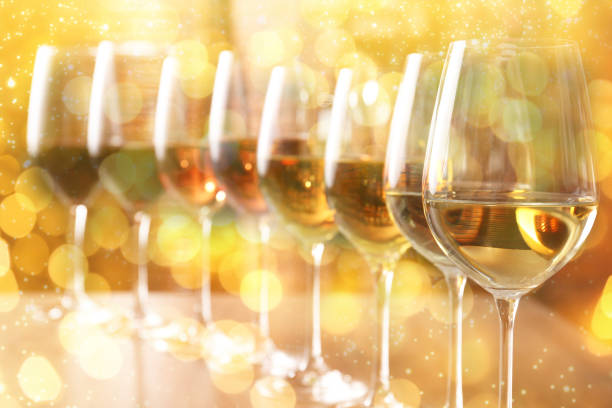 istock Different tasty wines in glasses on table. Bokeh effect 2177324415