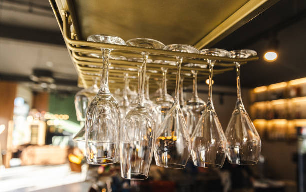 istock Upside Down Wine Glasses Hanging in a Bar Setting 2177324923