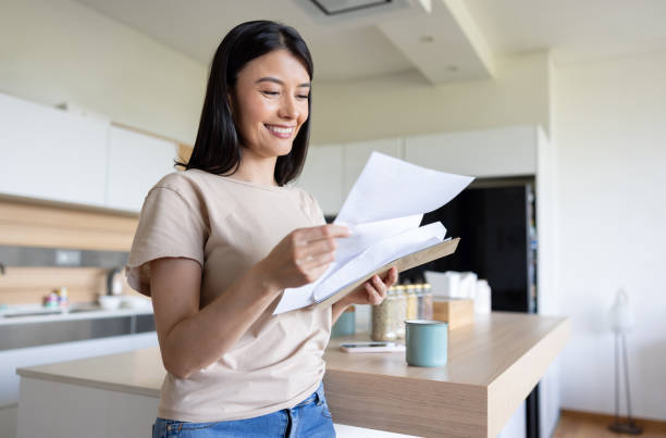 istock Woman at reading a letter she got in the mail 2177327174