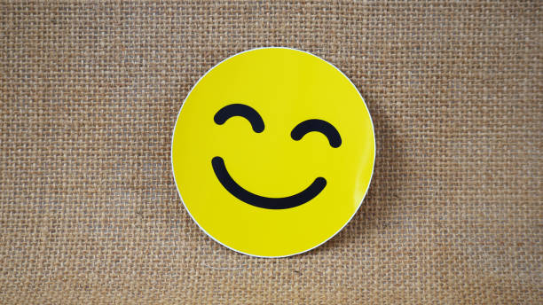 yellow smile emoji sticker on burlap