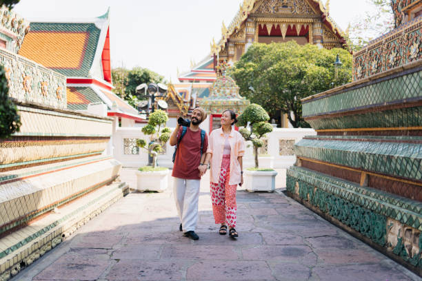istock Interracial couple exploring the ancient architecture in Thailand 2177329014