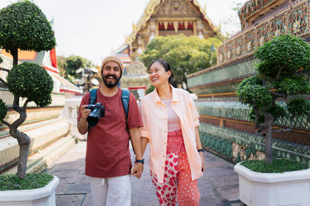 Happy diverse couple visiting an ancient place