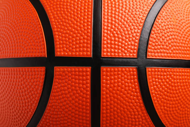 istock Orange basketball ball as background, closeup view 2177329239