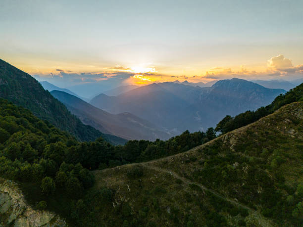 Free Stock Photo of Sunset over mountainous landscape with dramatic ...