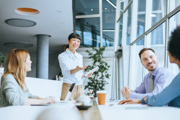 istock Team leader addressing colleagues in meeting 2177333146