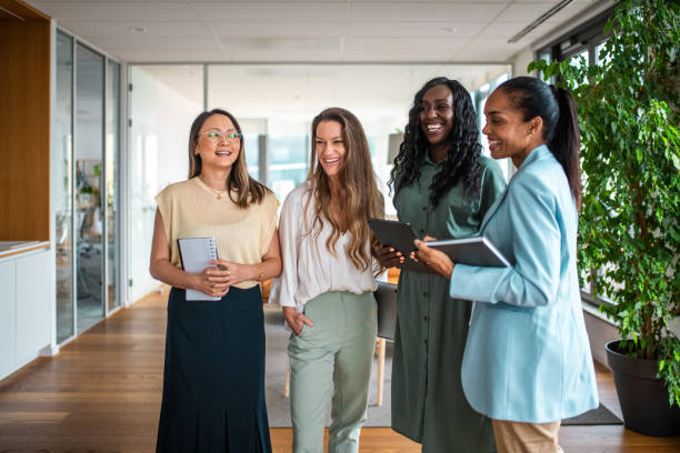 istock Diverse Businesswomen Engaging in Office Discussions 2177334964