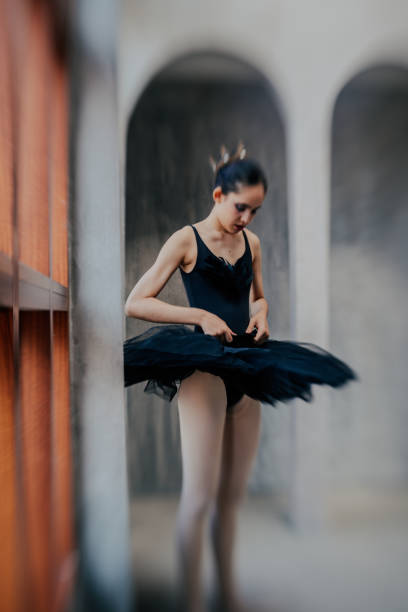 istock Young female ballet students rehearsing in studio 2177339288