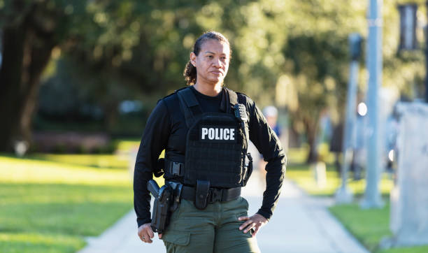 istock Mature multiracial policewoman patrolling on foot 2177343919