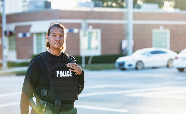 istock Mature multiracial policewoman patrolling on foot 2177343920