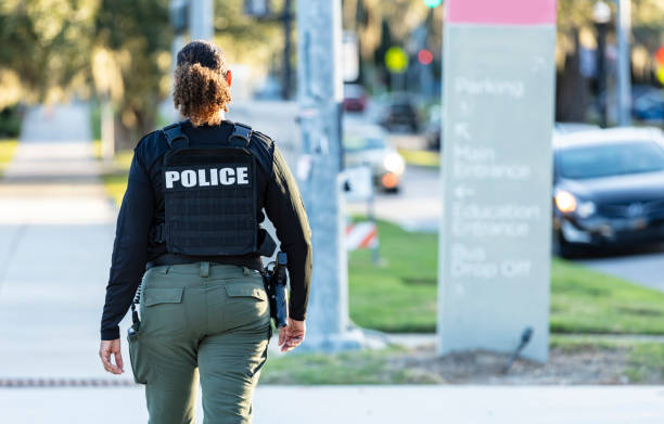 istock Mature multiracial policewoman patrolling on foot 2177343930