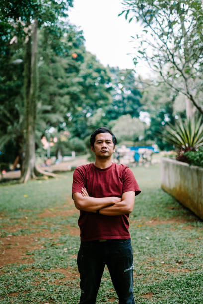 istock Southeast Asian man with arms crossed 2177351779