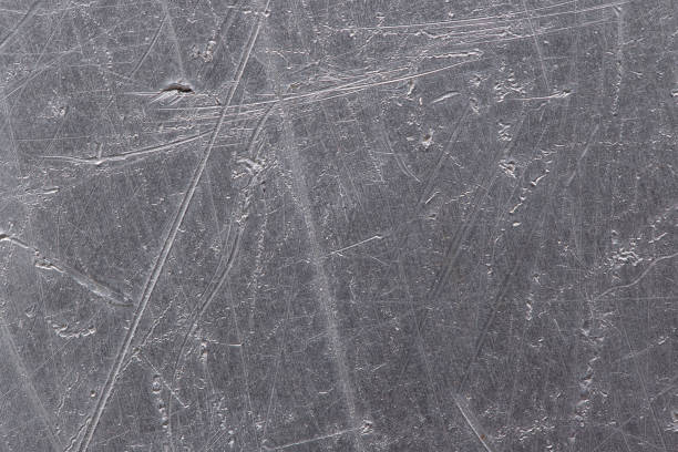 istock silver metal alloy as background. scratched aluminum texture 2177352961