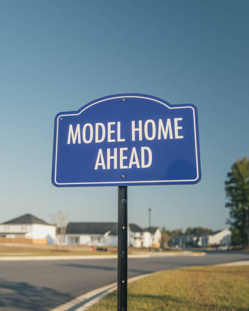 istock North Carolina - Model Home Ahead Sign - Vertical 2177355077