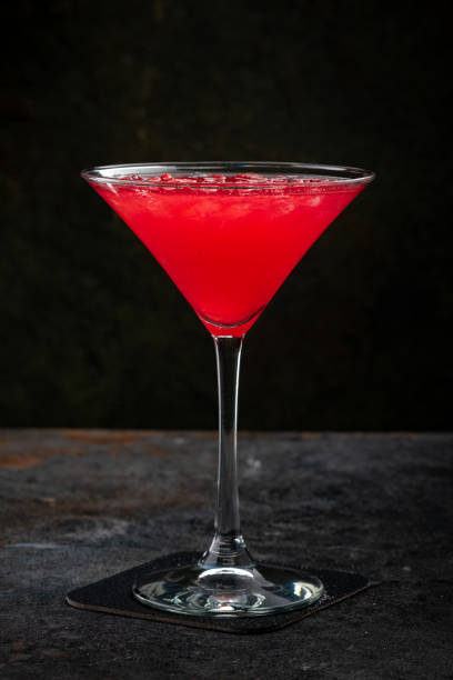 istock Classic cosmopolitan Cocktail on a dark stone background for the bar menu 2177359272