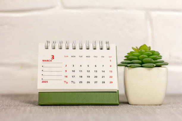 istock March 2025 on the table. Desk calendar for planning and organizing time. 2177359862