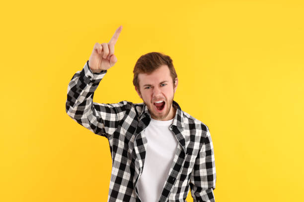 istock Concept of people, young man on yellow background 2177362191
