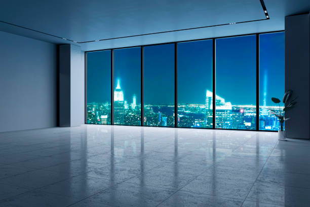 istock Empty office room with city view at night. 3D Rendering 2177369333